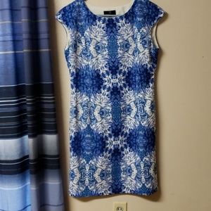 White dress with blue flowers